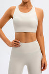 LC264647-P1-S, LC264647-P1-M, LC264647-P1-L, LC264647-P1-XL, White Solid Color Asymmetric Cut Out Sports Bra