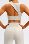 LC264647-P1-S, LC264647-P1-M, LC264647-P1-L, LC264647-P1-XL, White Solid Color Asymmetric Cut Out Sports Bra