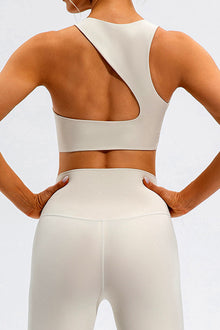  LC264647-P1-S, LC264647-P1-M, LC264647-P1-L, LC264647-P1-XL, White Solid Color Asymmetric Cut Out Sports Bra