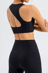 LC264647-P2-S, LC264647-P2-M, LC264647-P2-L, LC264647-P2-XL, Black Solid Color Asymmetric Cut Out Sports Bra