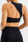 LC264647-P2-S, LC264647-P2-M, LC264647-P2-L, LC264647-P2-XL, Black Solid Color Asymmetric Cut Out Sports Bra
