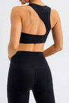 LC264647-P2-S, LC264647-P2-M, LC264647-P2-L, LC264647-P2-XL, Black Solid Color Asymmetric Cut Out Sports Bra