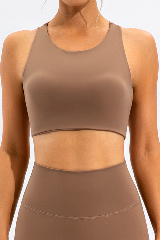 LC264647-P1016-S, LC264647-P1016-M, LC264647-P1016-L, LC264647-P1016-XL, Camel Solid Color Asymmetric Cut Out Sports Bra