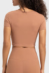 PACK264696-P8010-1, Rose Tan Front Cut Out Ribbed Short Sleeve Sports Crop Top