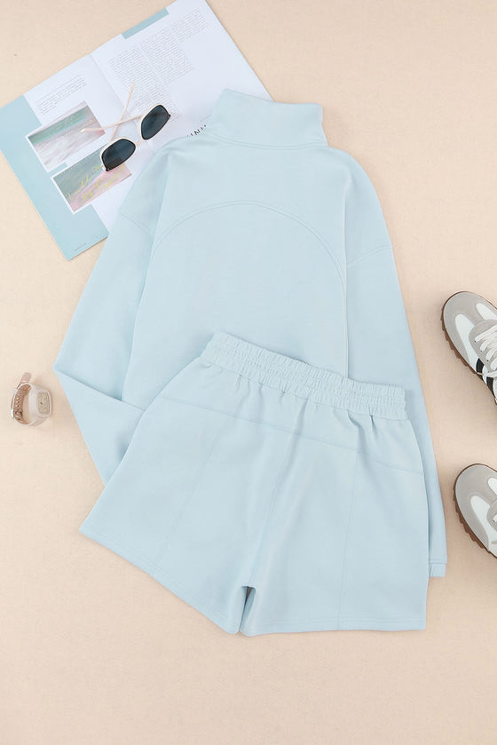 Sky Blue Solid Half Zip Pocketed Sweatshirt And Shorts Sports Set