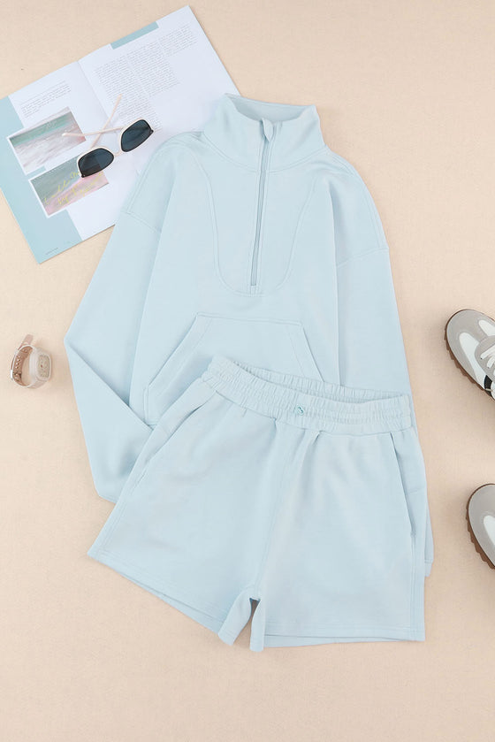 Sky Blue Solid Half Zip Pocketed Sweatshirt And Shorts Sports Set