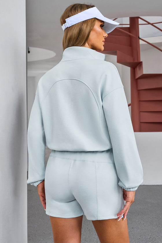 Sky Blue Solid Half Zip Pocketed Sweatshirt And Shorts Sports Set
