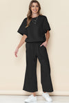 Black Textured Loose Fit T Shirt And Drawstring Pants Set